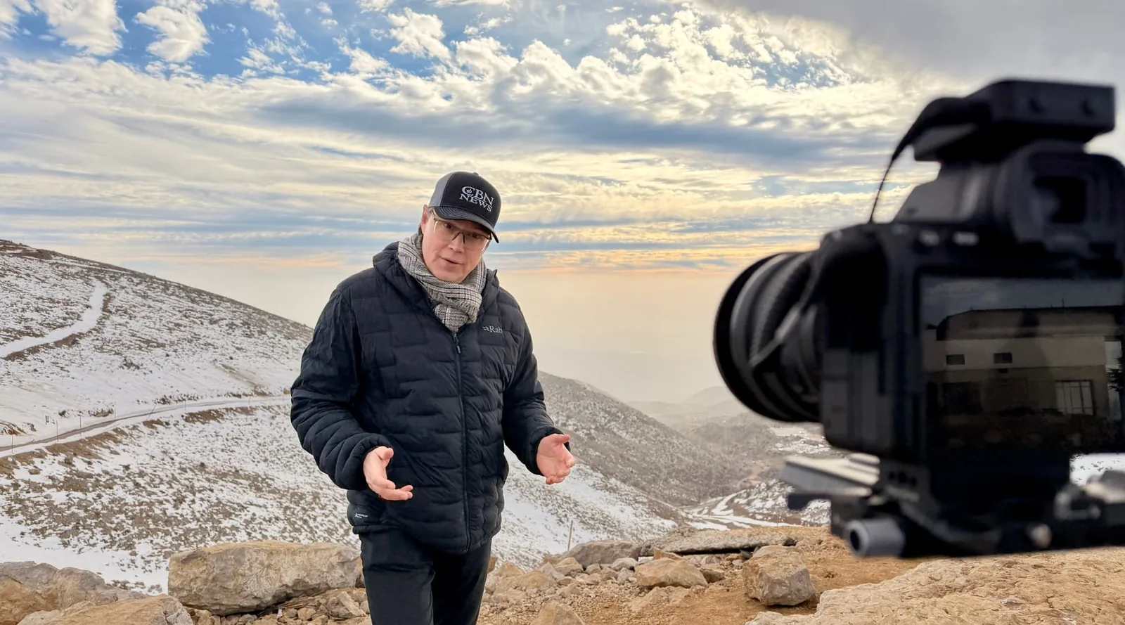 Joshua Swanson reporting for CBN News on Mount Hermon at the Syrian border